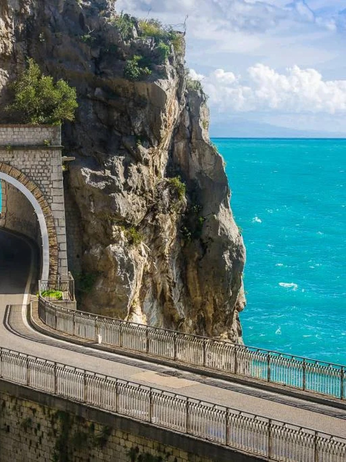 a stone bridge over a body of water