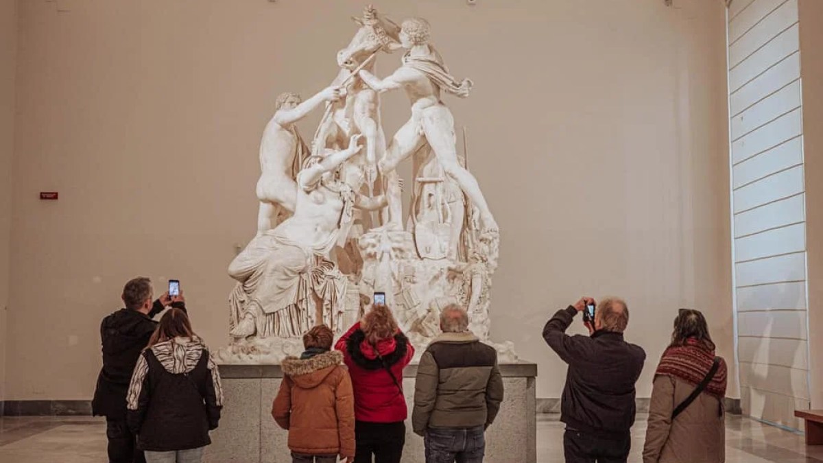 a group of people standing in a room