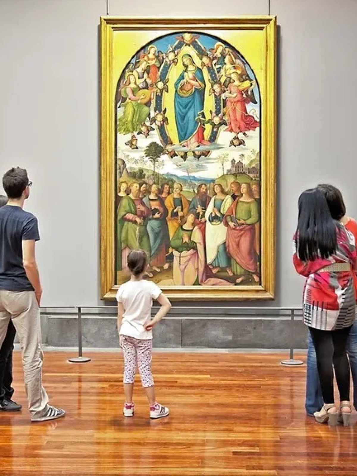 a group of people standing in a room