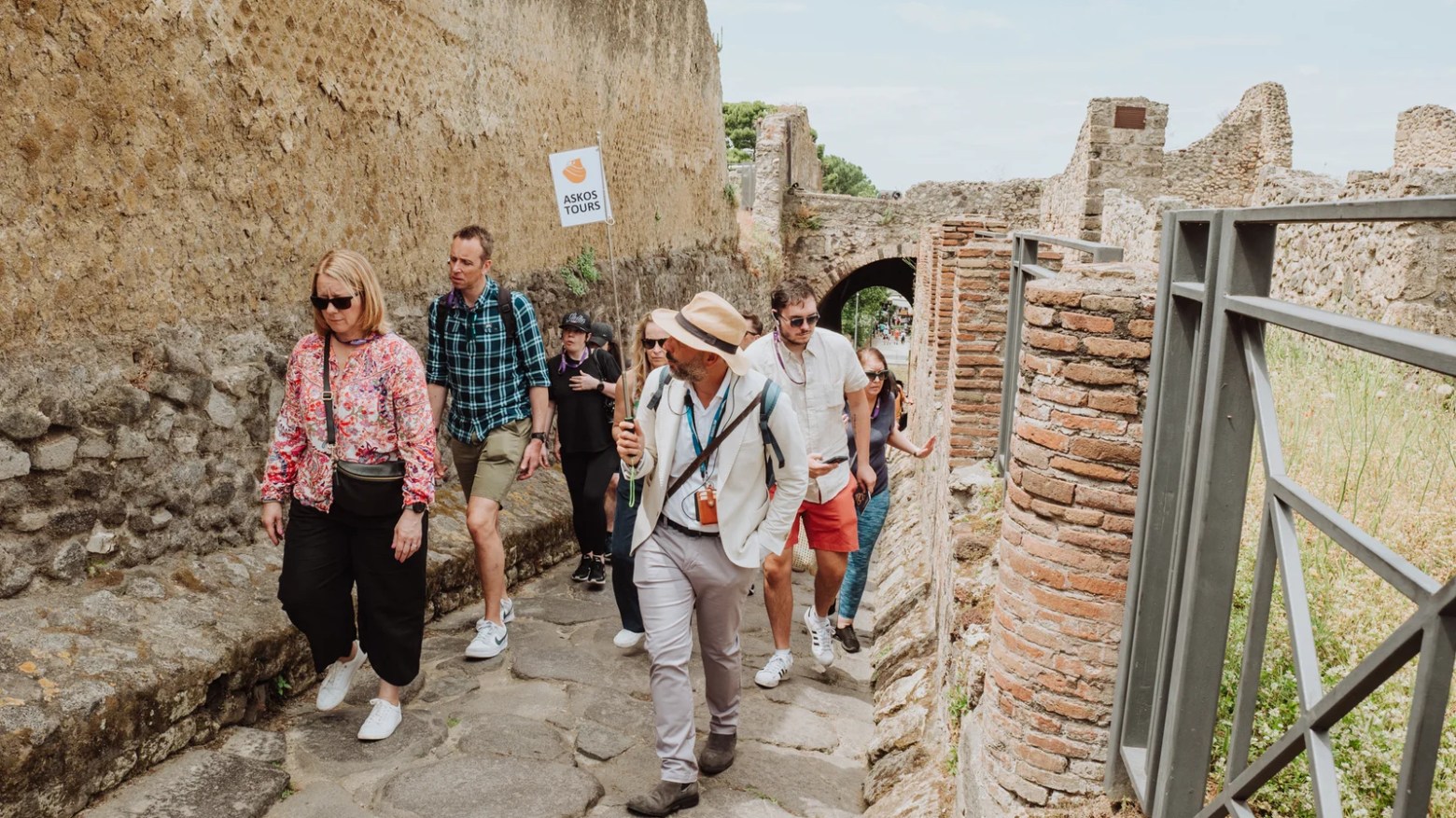 a group of people standing outside of a building