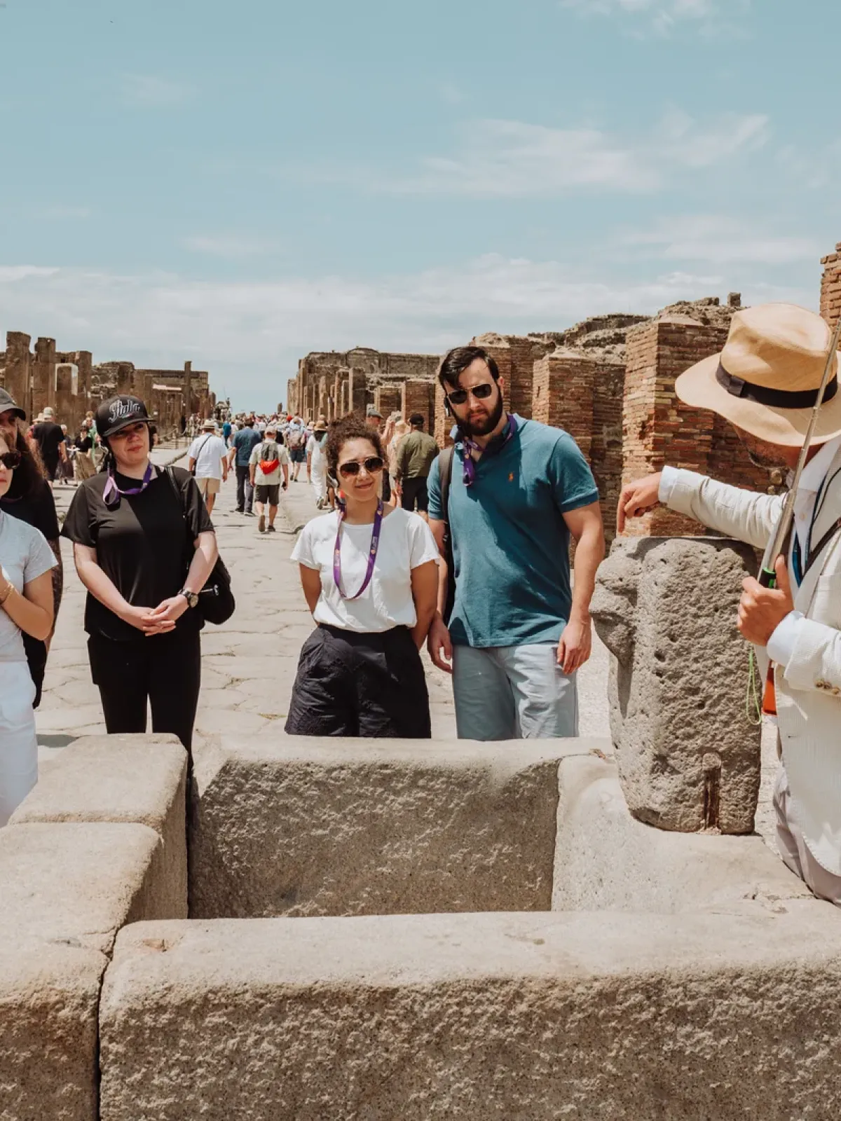 a group of people standing in front of a crowd