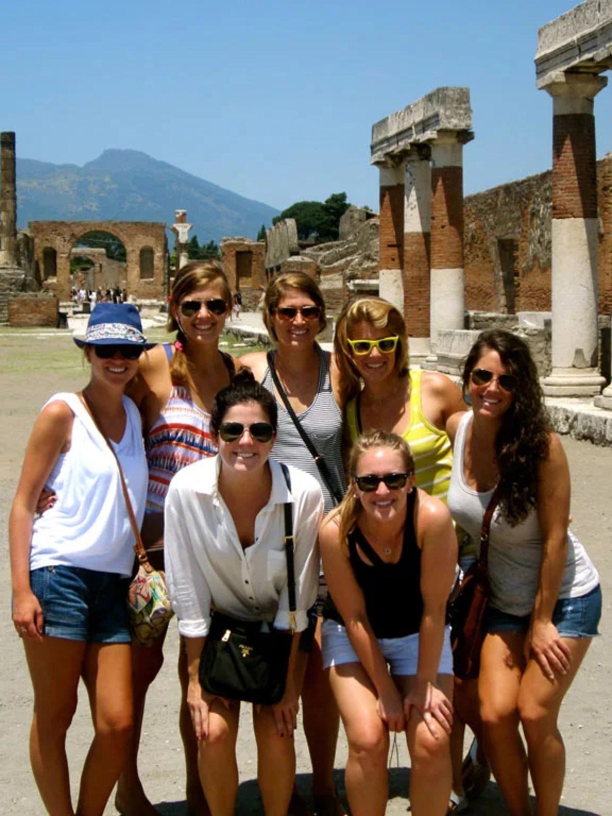 a group of people posing for the camera