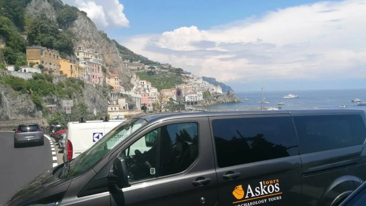 a car parked on the side of a mountain