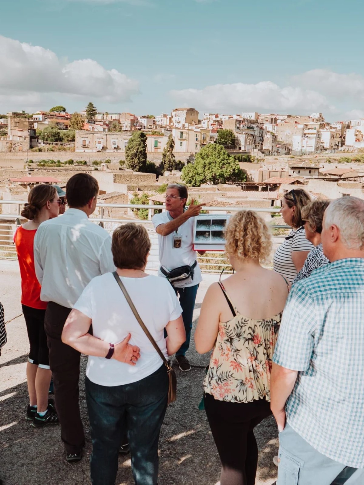 a group of people standing in front of a crowd