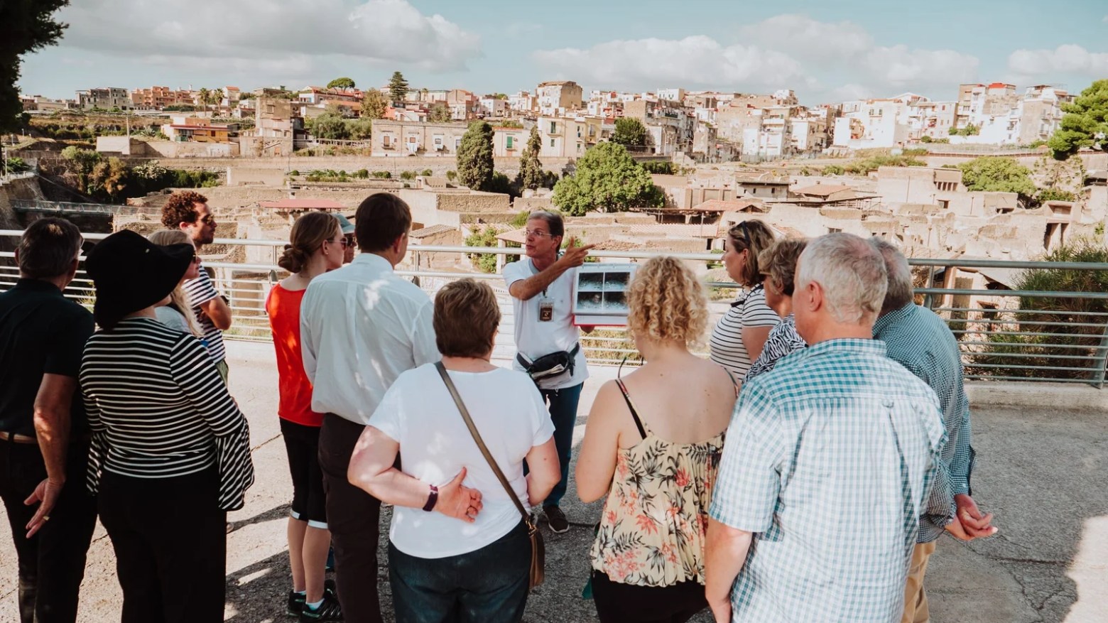a group of people standing in front of a crowd