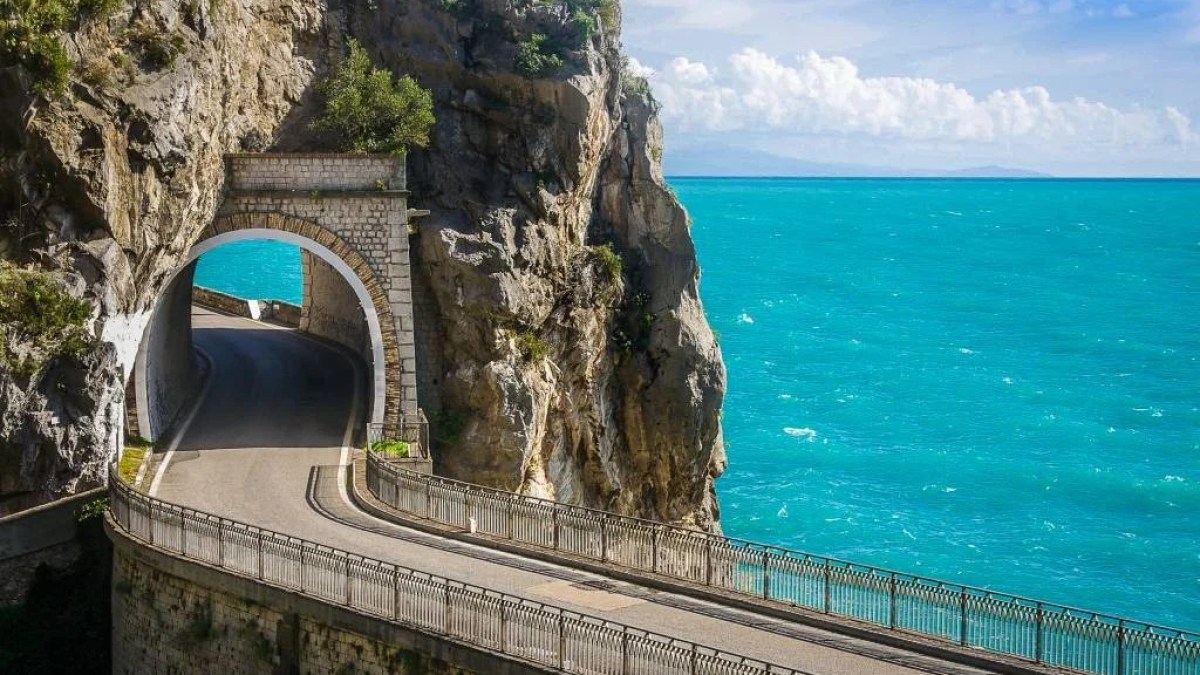 a stone bridge over a body of water