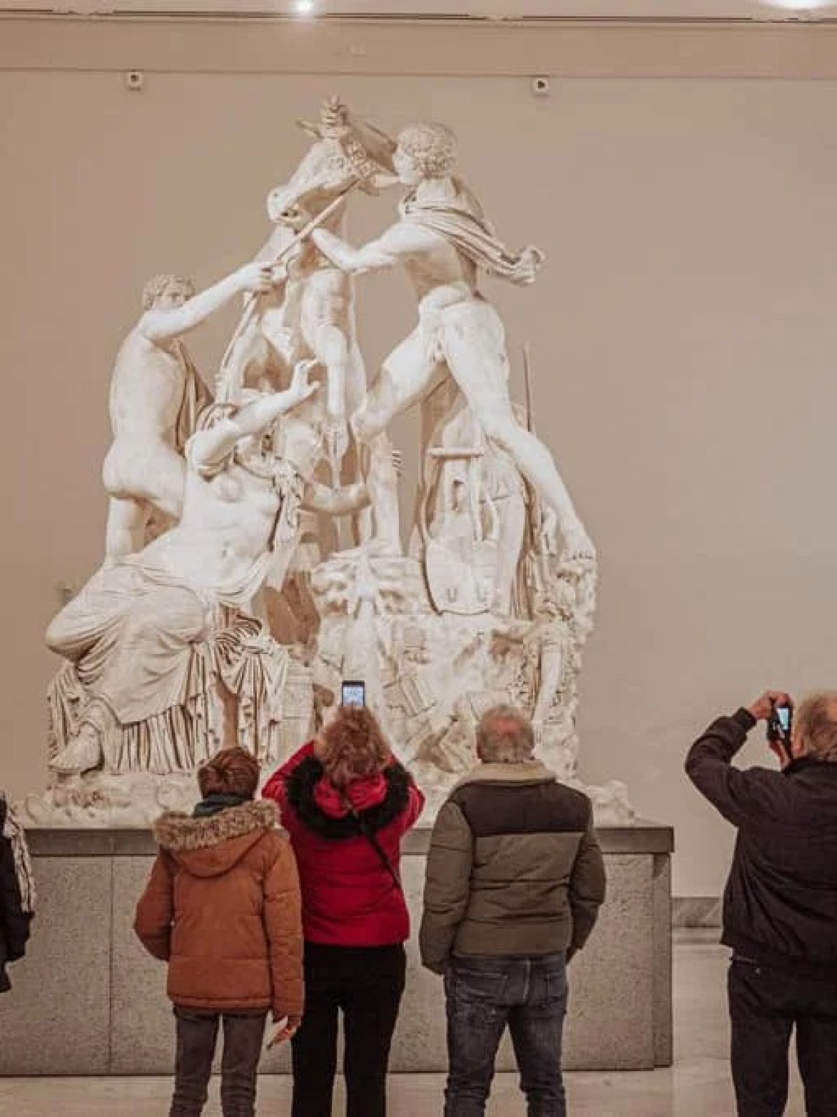a group of people standing in a room