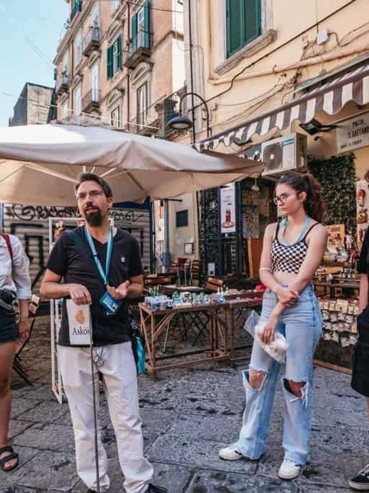 a group of people standing in front of a building