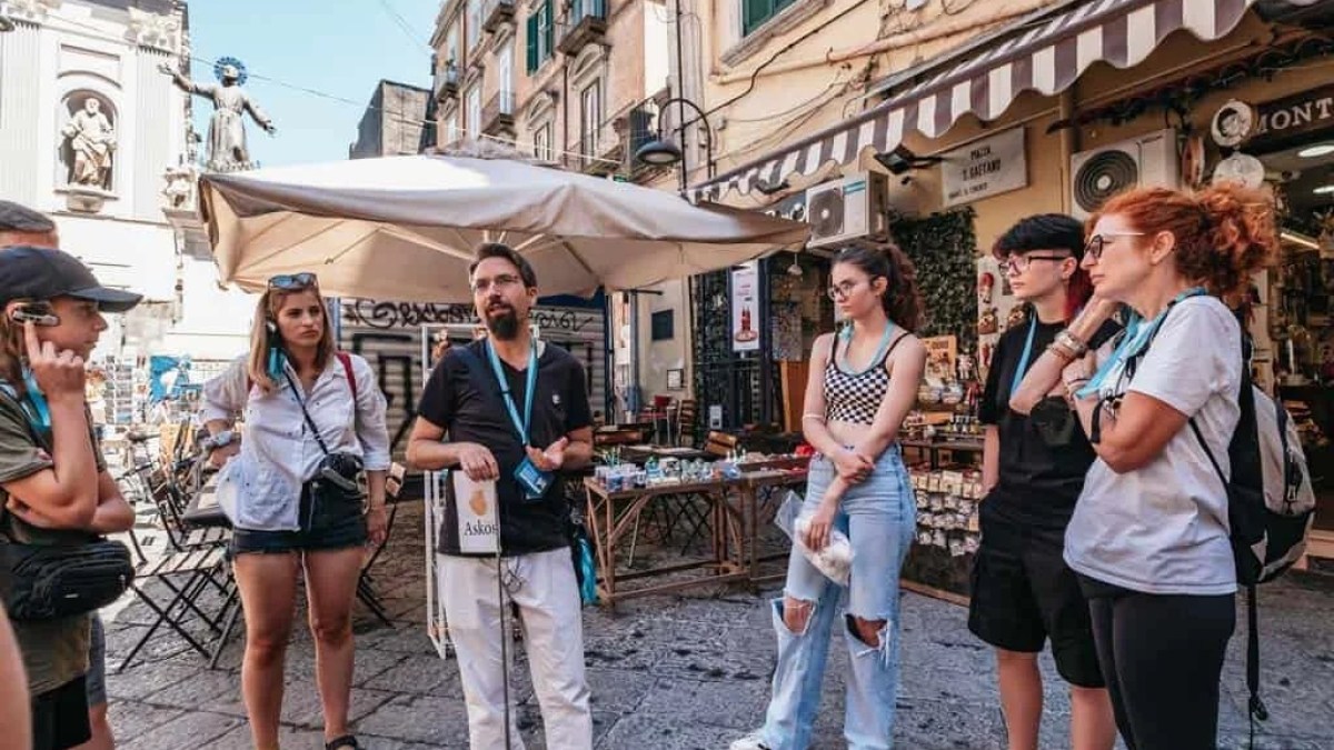 a group of people standing in front of a building