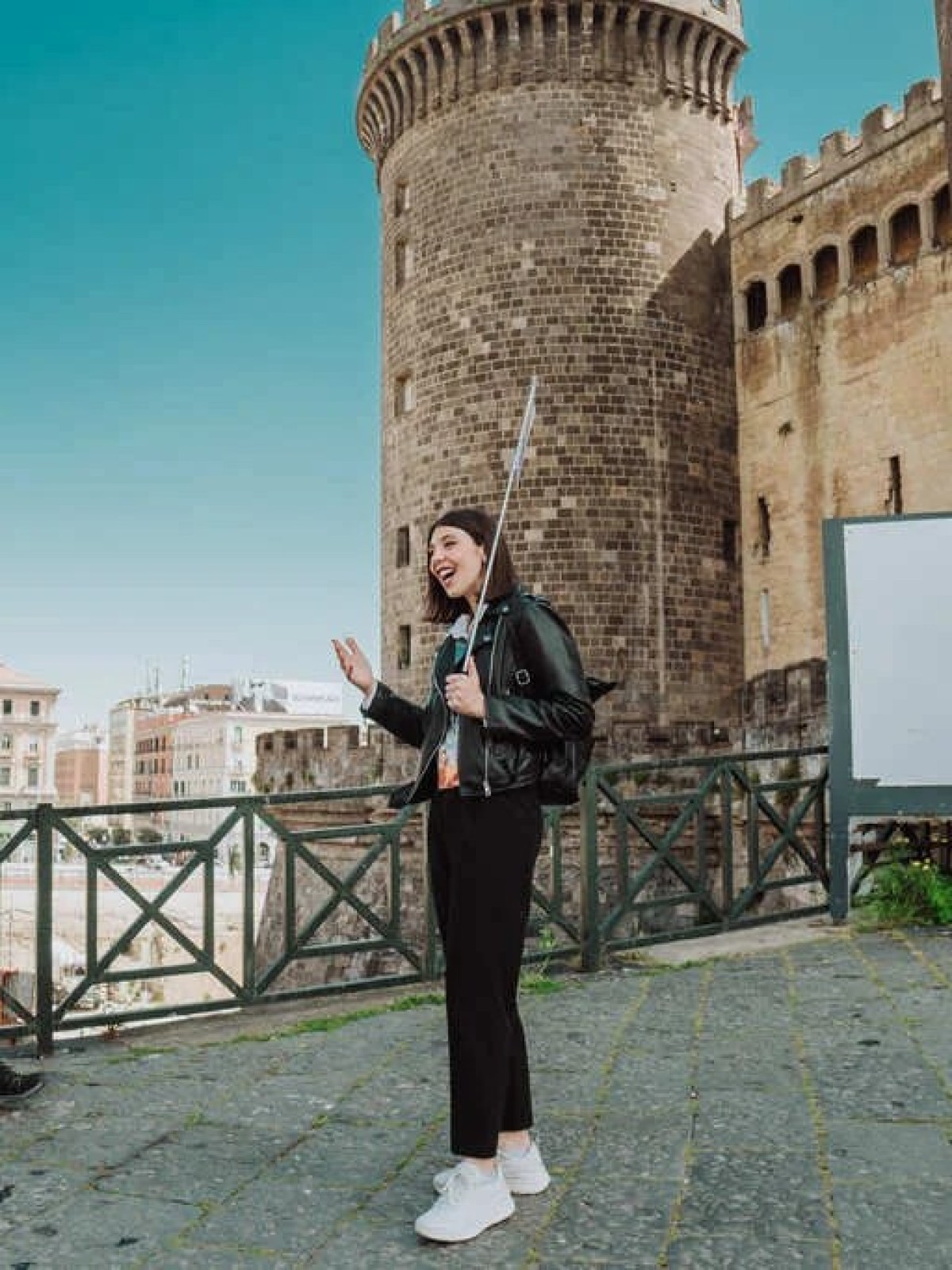 a group of people standing in front of a building