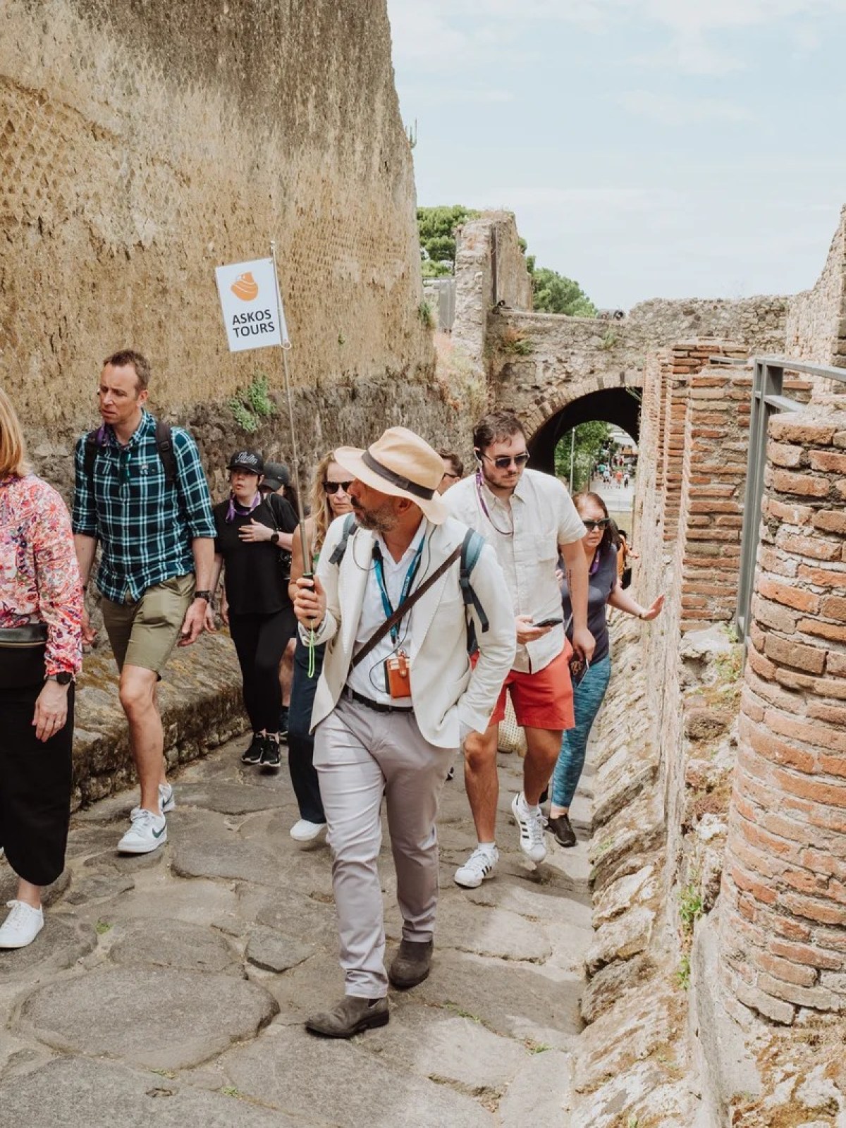 a group of people standing outside of a building