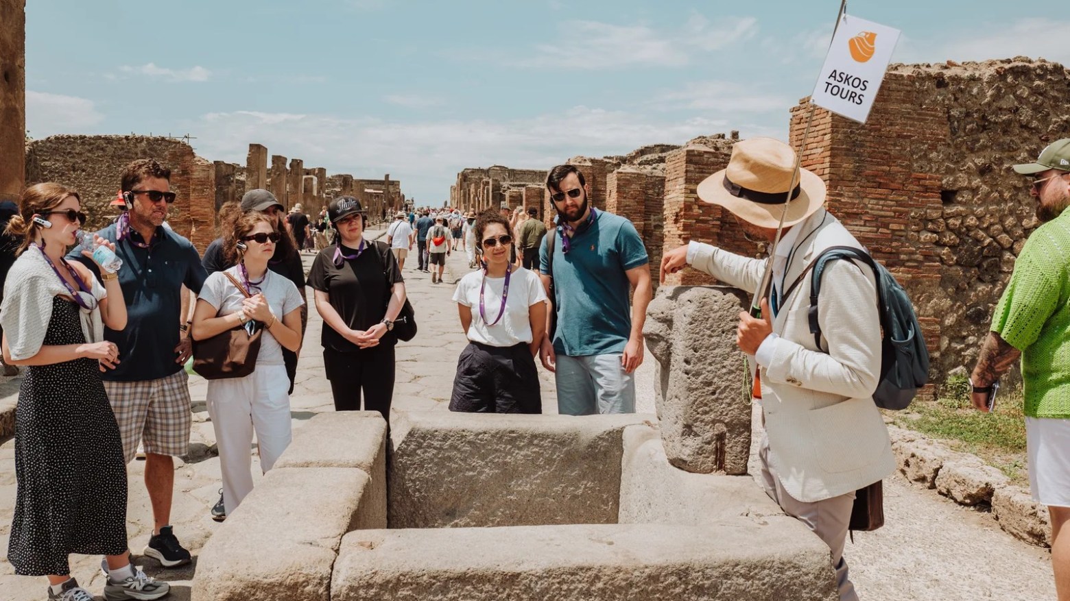a group of people standing in front of a crowd