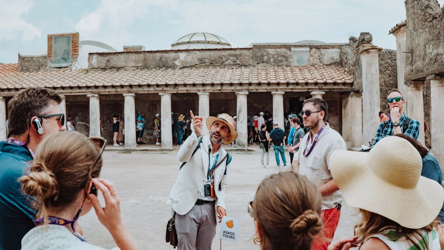 a group of people standing in front of a building