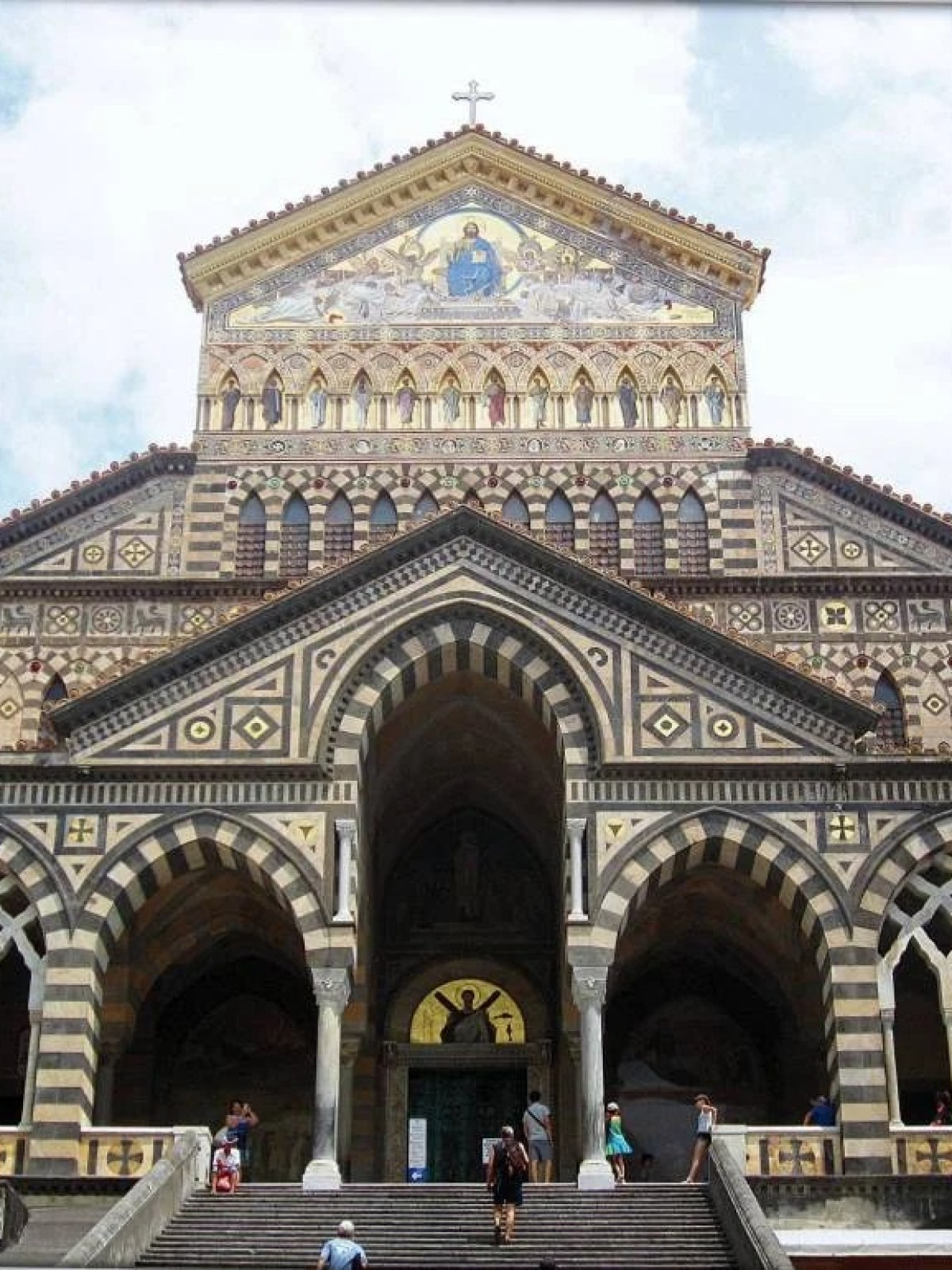 a group of people standing in front of Amalfi