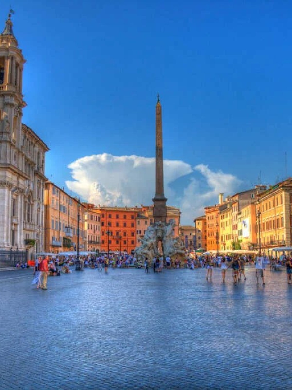 a group of people standing in front of Piazza Navona