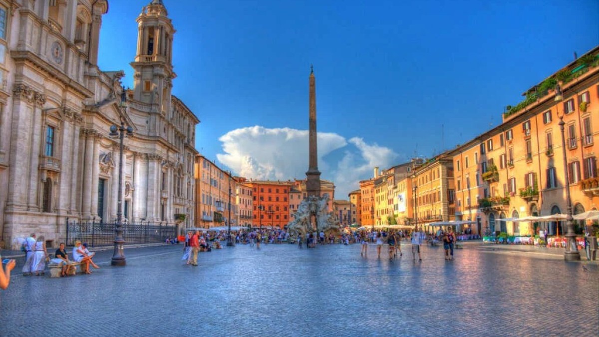 a group of people standing in front of Piazza Navona