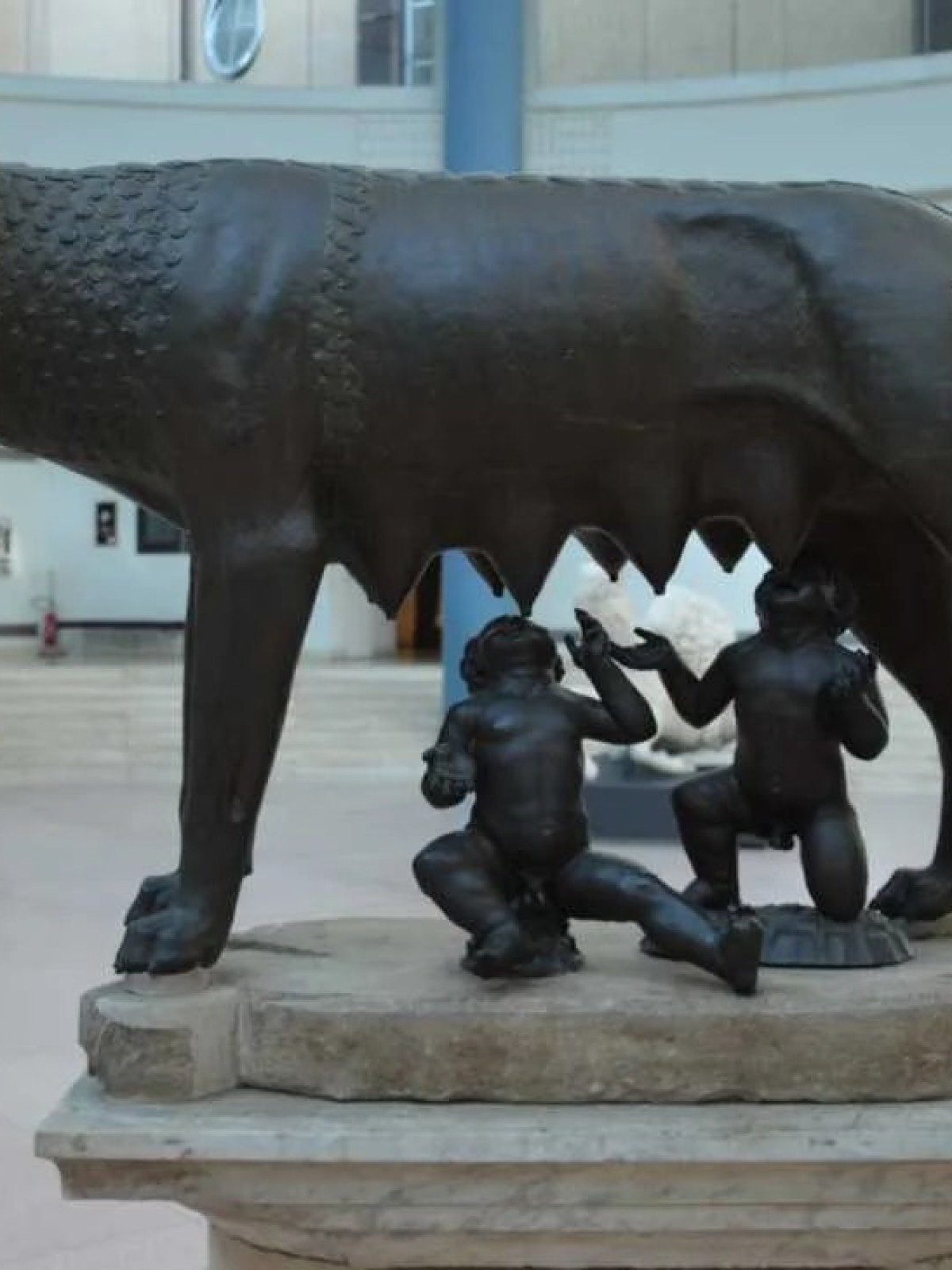 a horse statue in front of a building