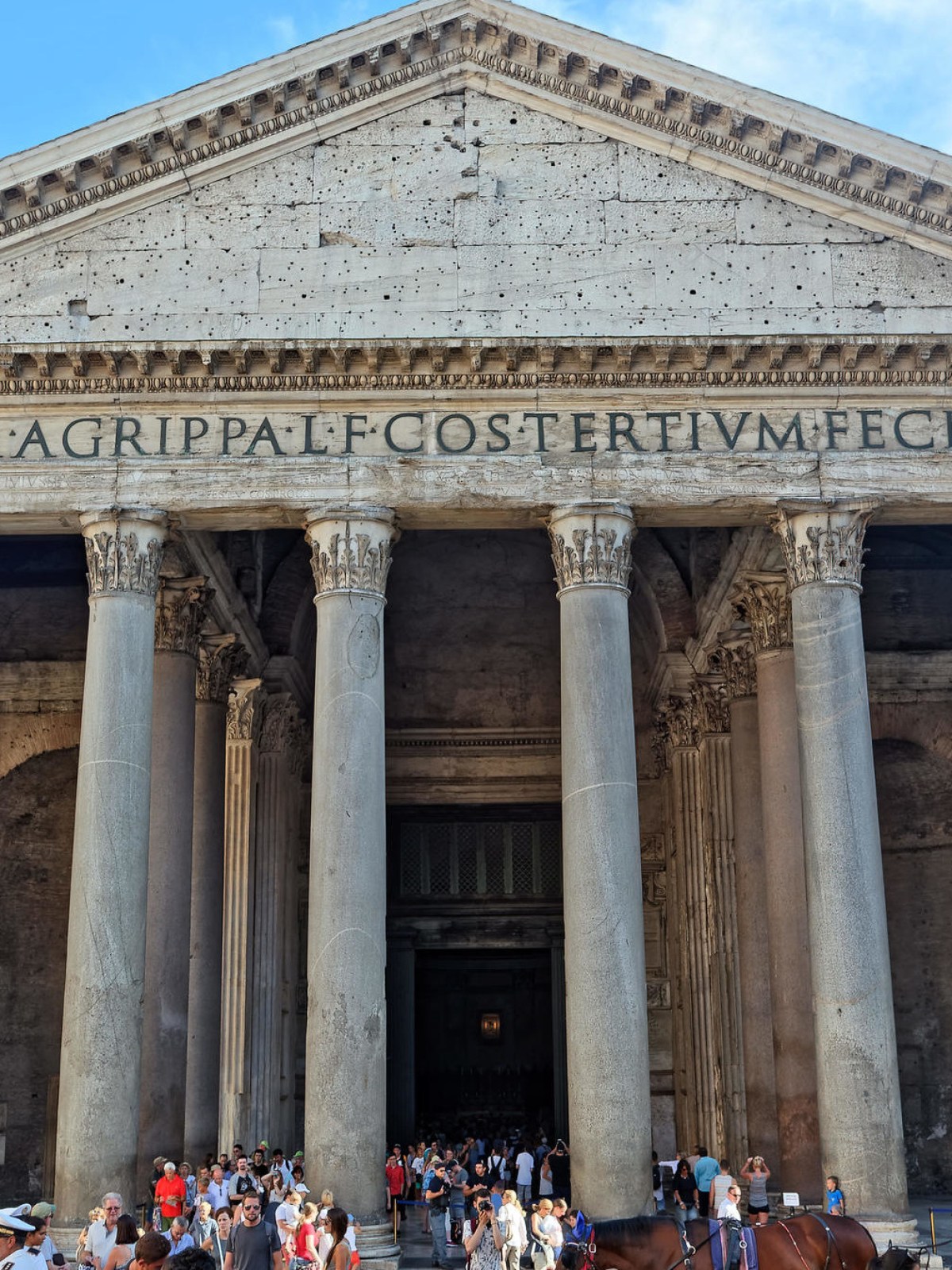 a group of people standing in front of Pantheon, Rome