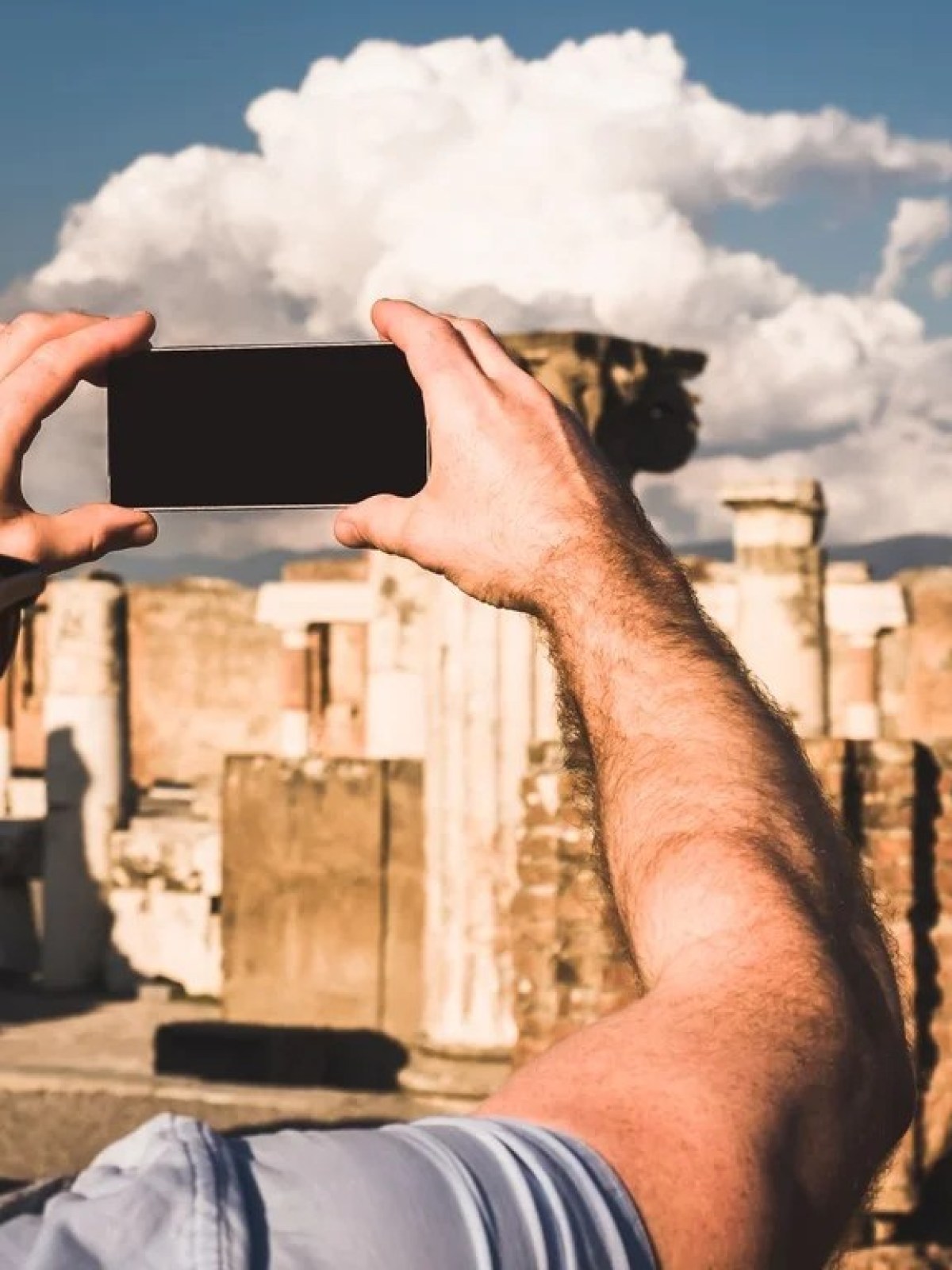 a man holding a cell phone