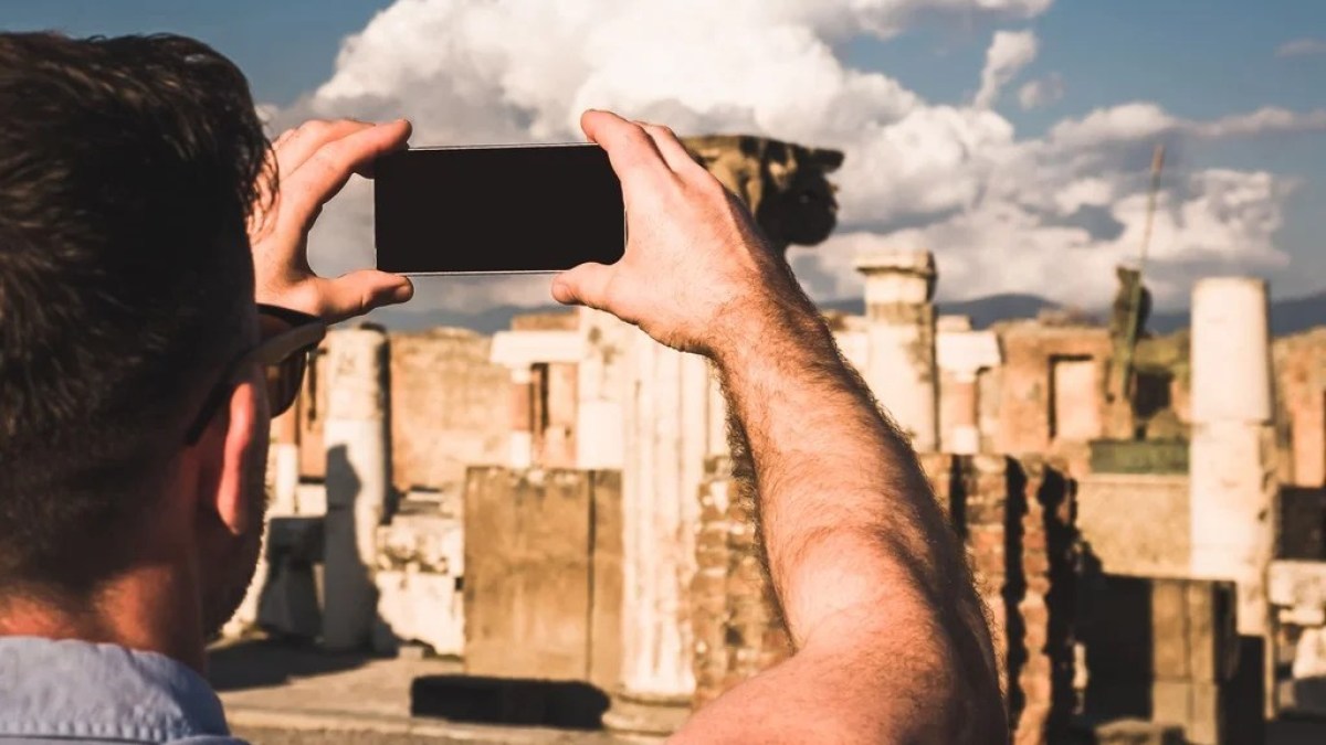 a man holding a cell phone