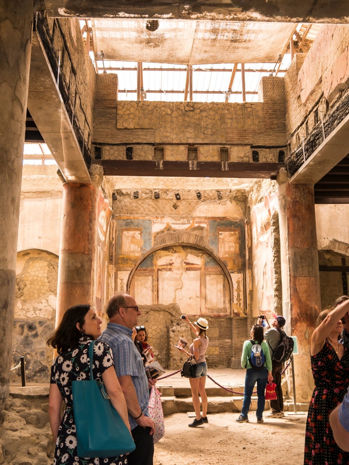 a group of people standing in front of a building