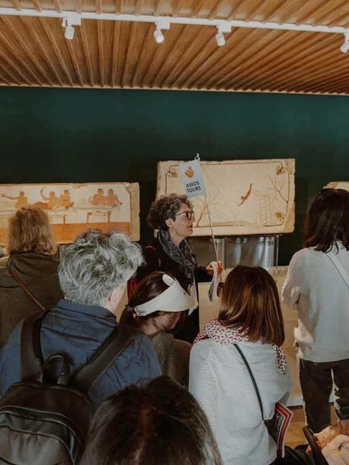 a group of people standing in front of a crowd