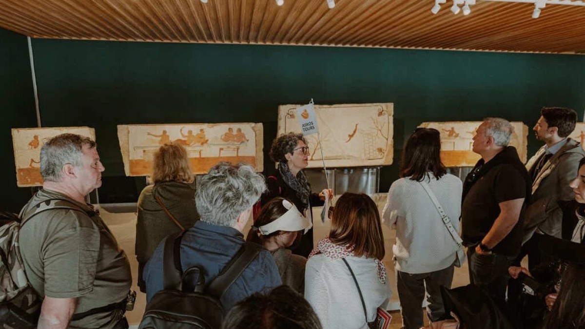 a group of people standing in front of a crowd