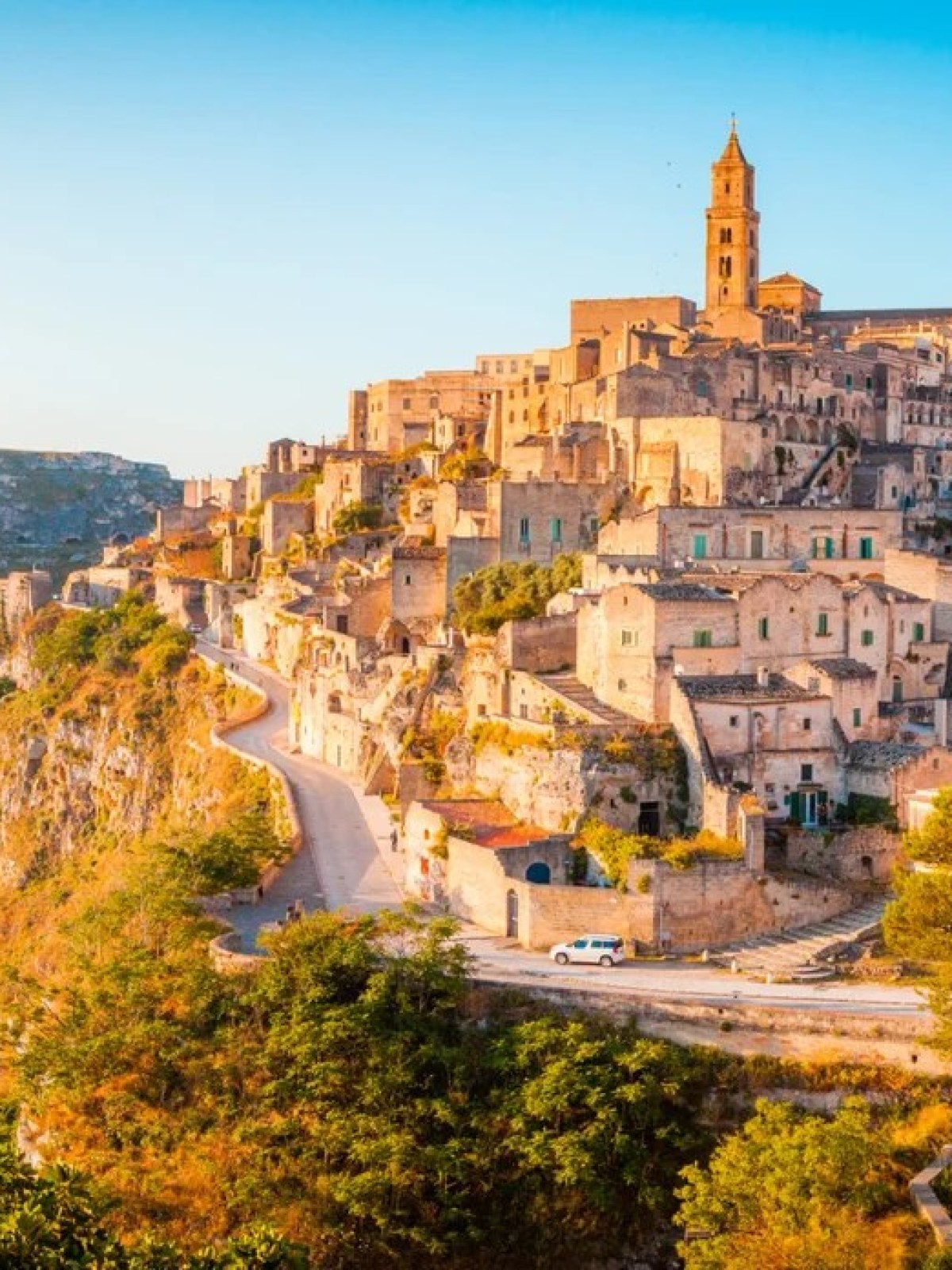 a canyon with Matera in the background