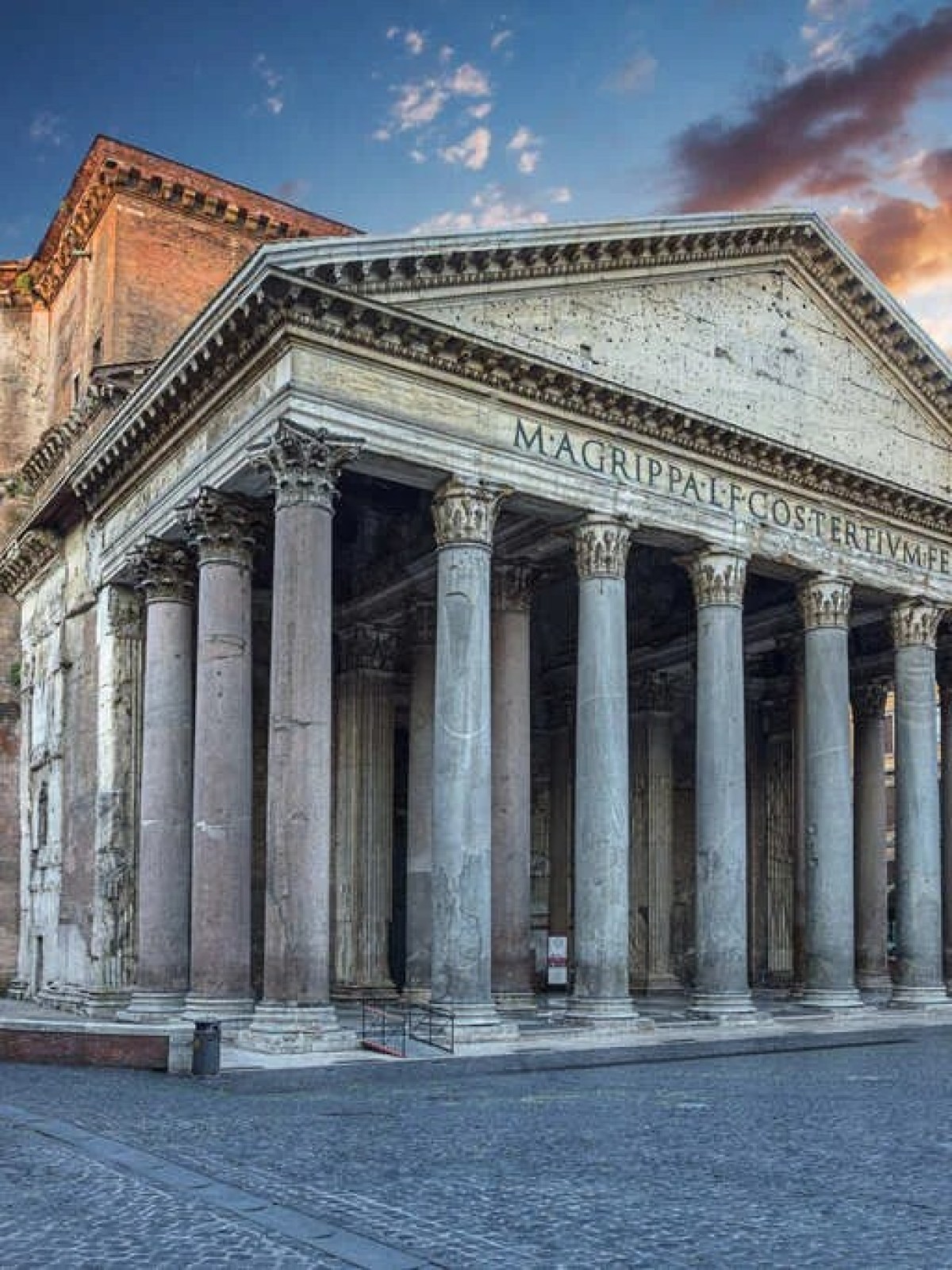 a large stone building with Pantheon, Rome in the background