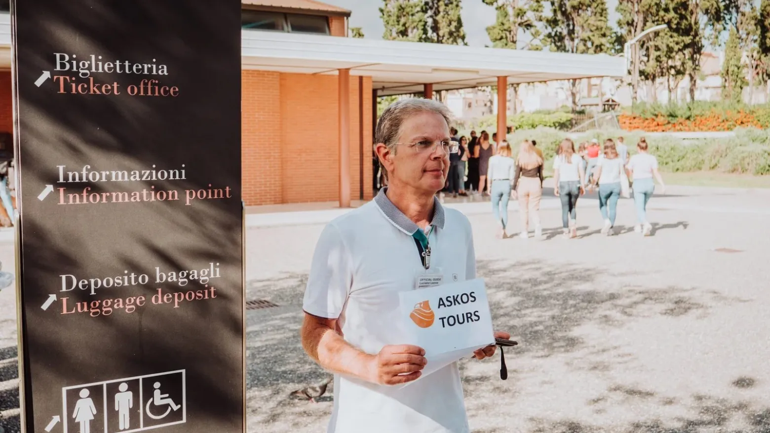 a man holding a sign