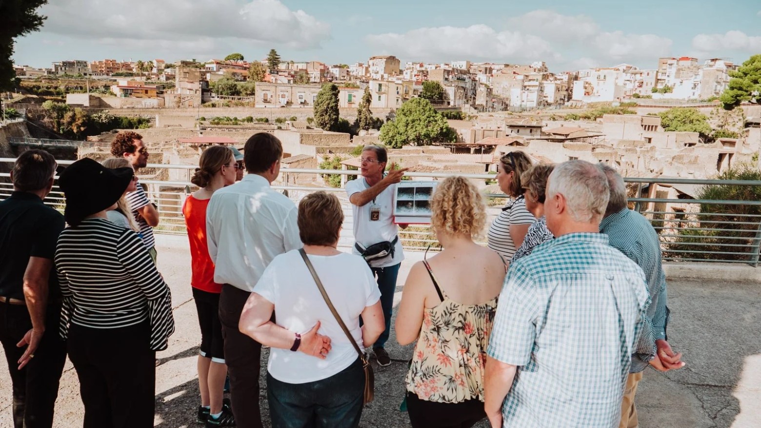 a group of people standing in front of a crowd