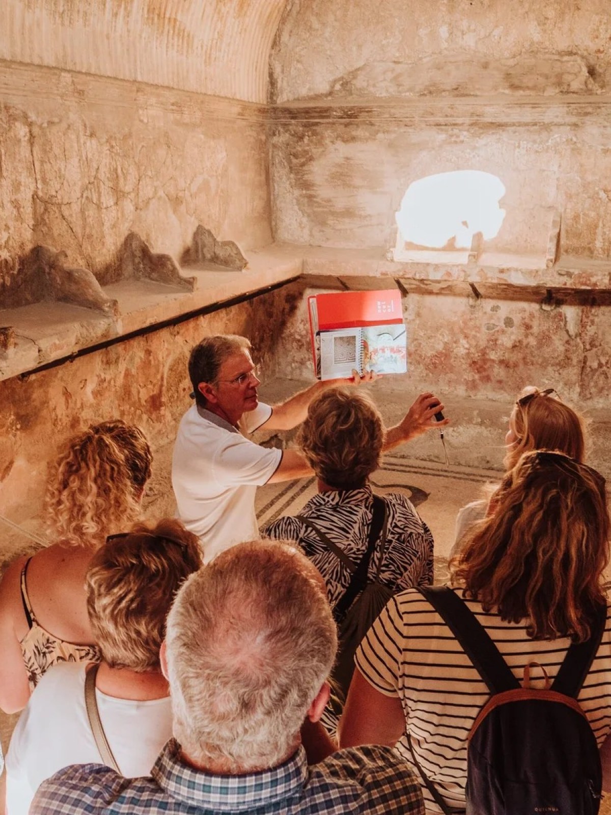 a group of people standing in front of a crowd