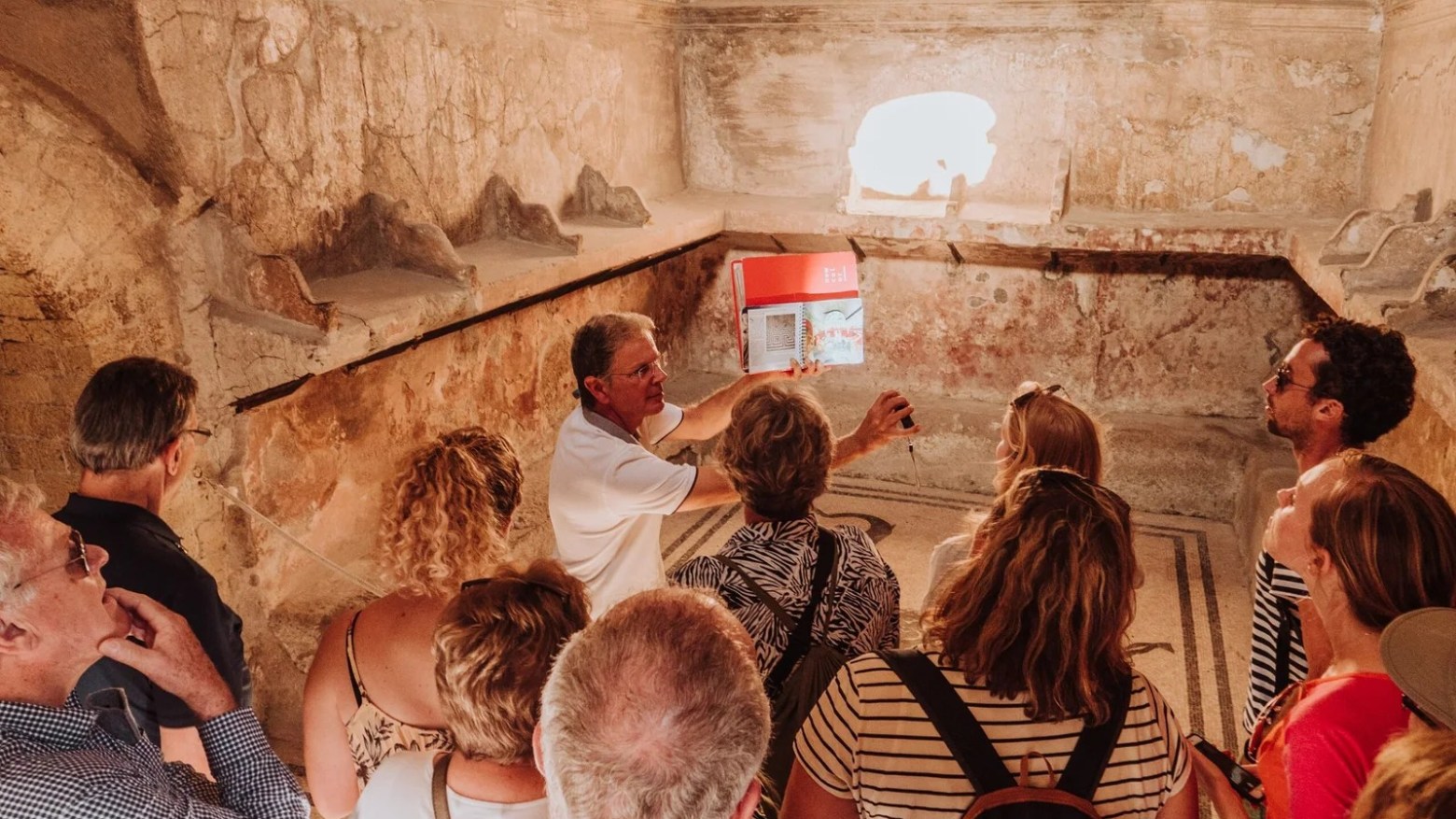 a group of people standing in front of a crowd