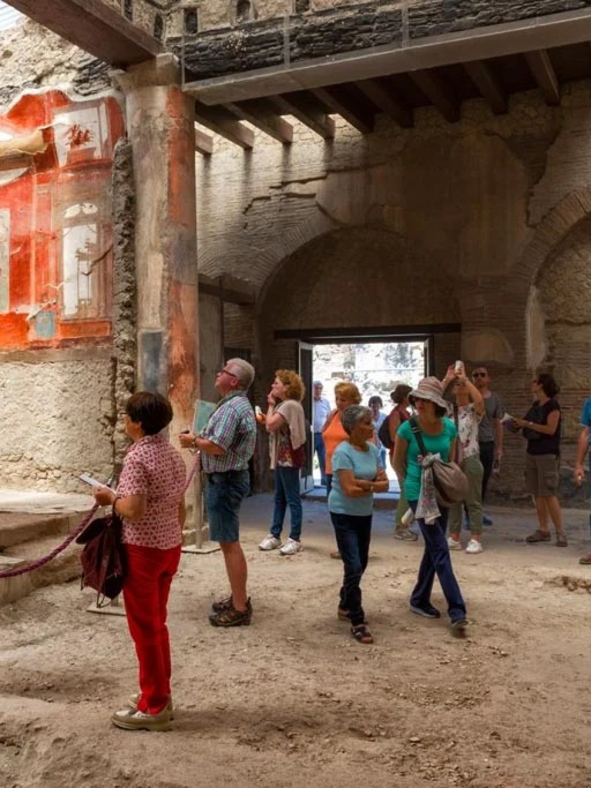 a group of people walking down a street