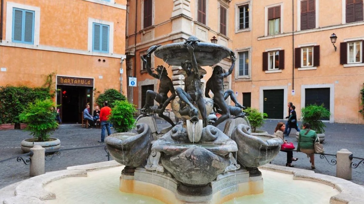 a statue in front of a building