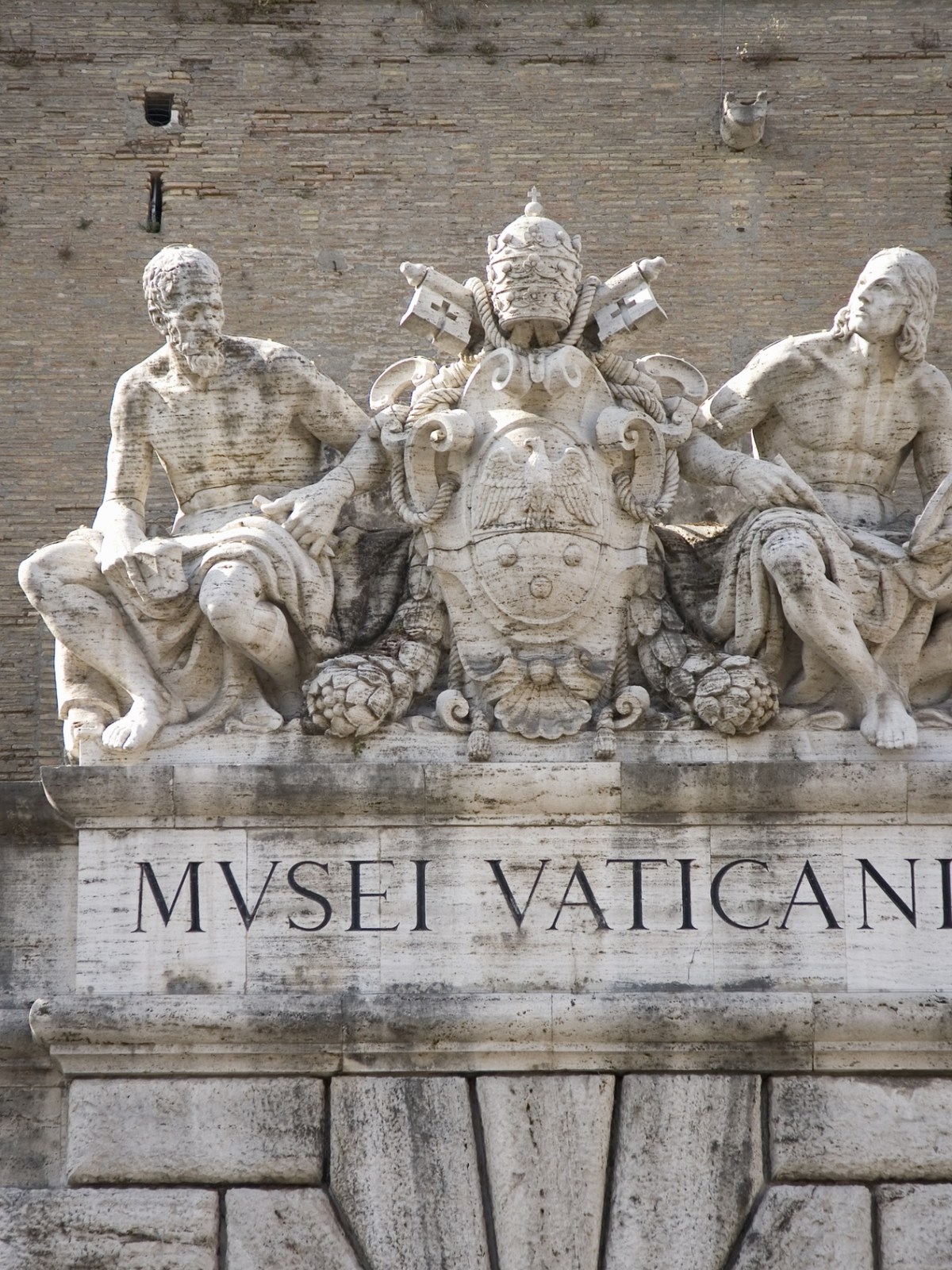 a statue in front of a building