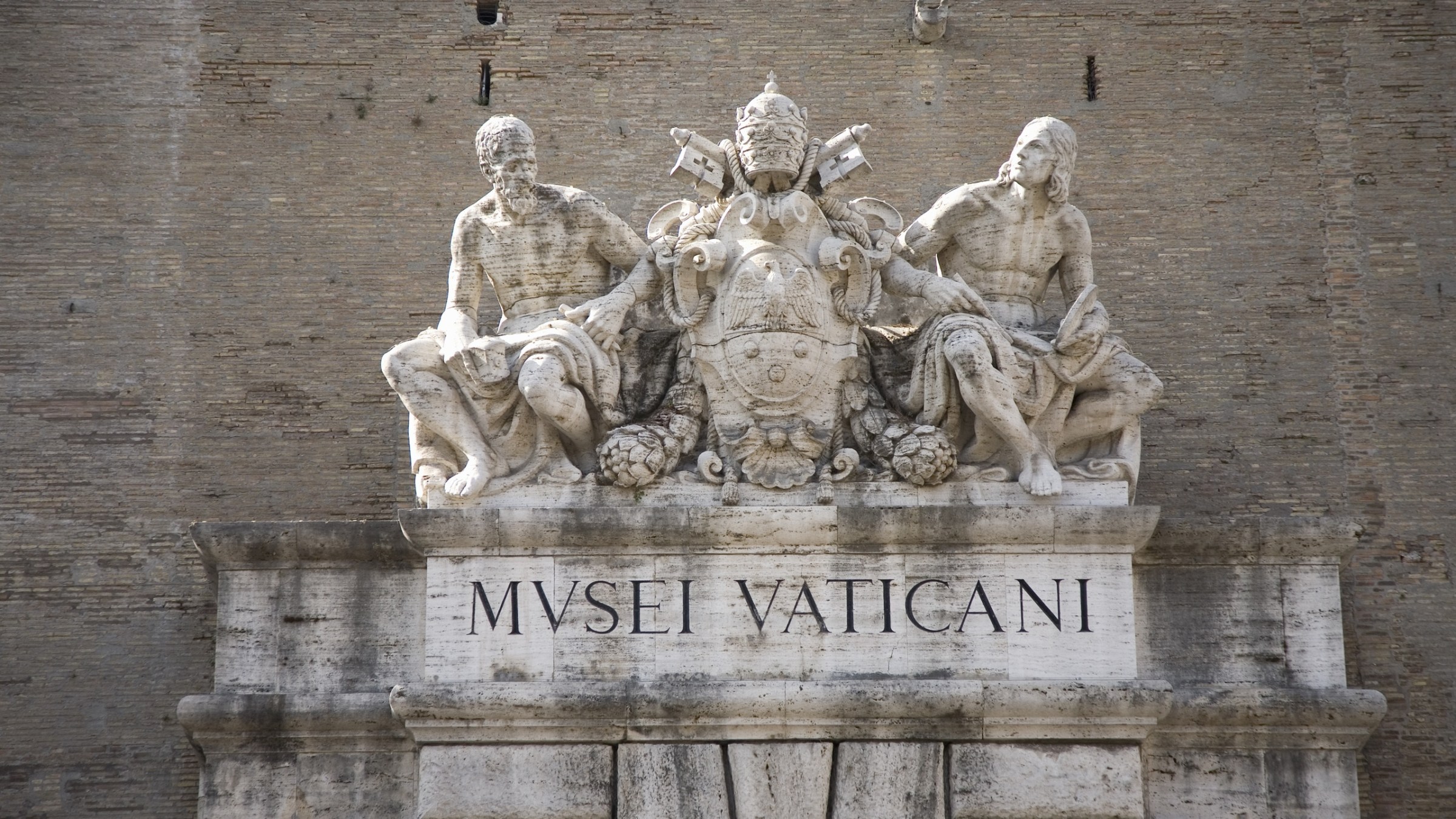 a statue in front of a building